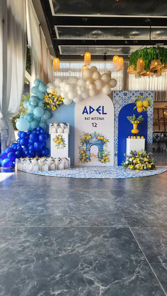 Event decoration installation by our customer in Israel, with printed backdrop panels and display plinths