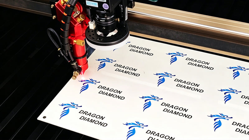 Camera-equipped CO2 laser processing acrylic printed with Dragon Diamond logos