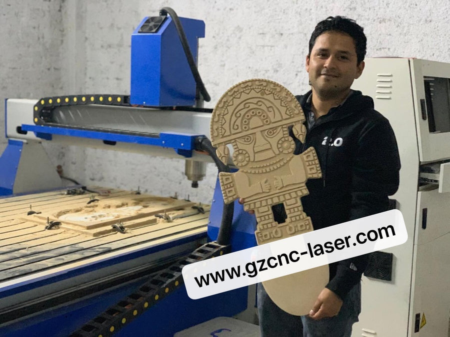 A customer holding a routed sample beside a CNC router