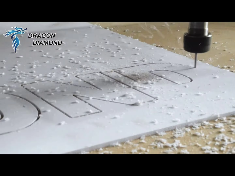 CNC routing demonstration on a white board
