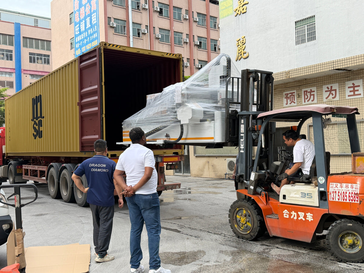 Customer watching CNC router container loading at the factory