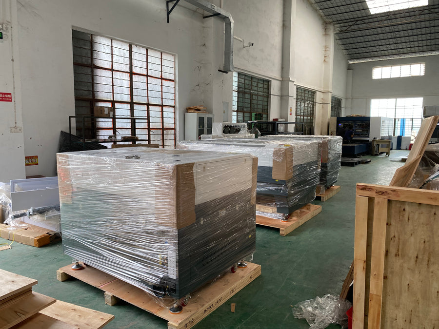 Wrapped machines on pallets in the workshop