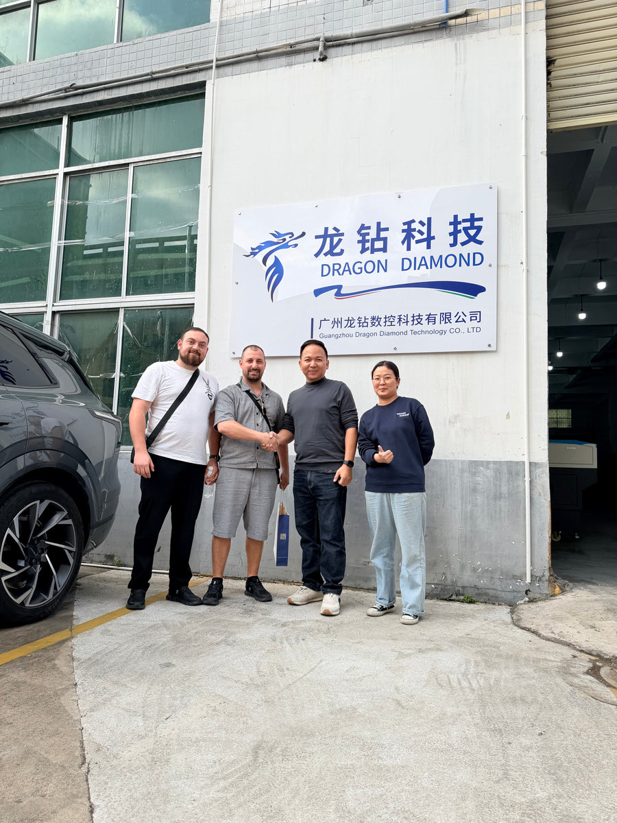 Customer group photo at the factory entrance